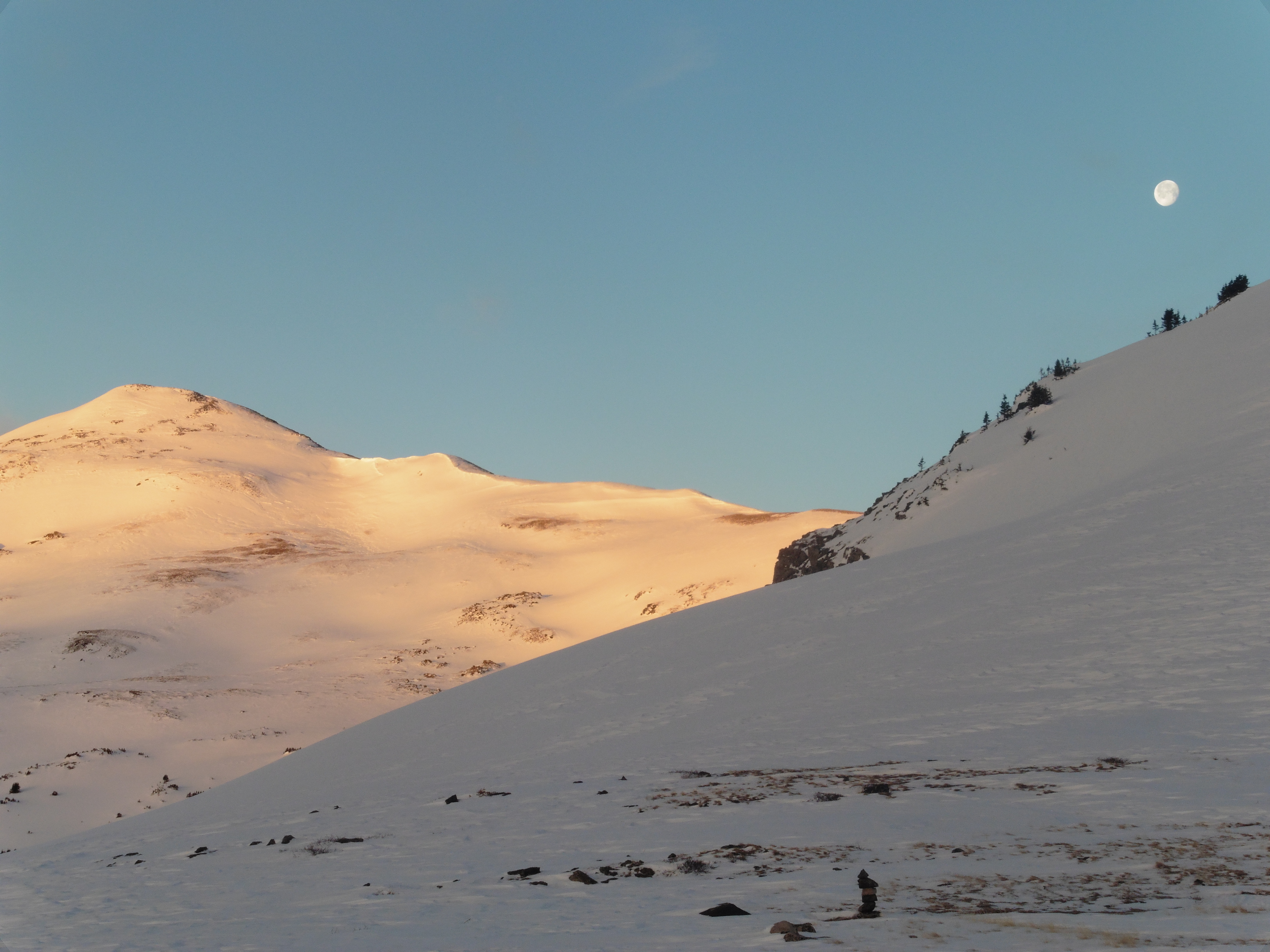 Moon setting over 12,780B in morning alpenglow.